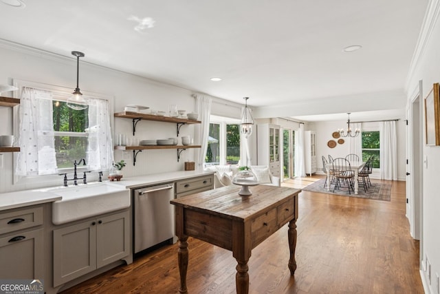 5095 Karr Rd, Cumming, GA 30040 - kitchen with stainless steel dishwasher, gray cabinetry, crown molding, plenty of natural light, and recessed lighting