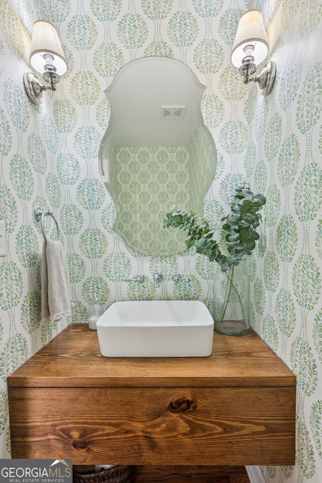 5095 Karr Rd, Cumming, GA 30040 - bathroom featuring wallpapered walls and vanity