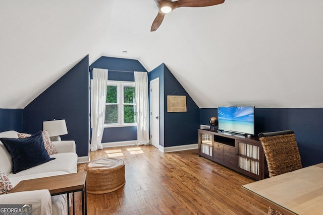 5095 Karr Rd, Cumming, GA 30040 - sitting room with wood finished floors, lofted ceiling, and a ceiling fan