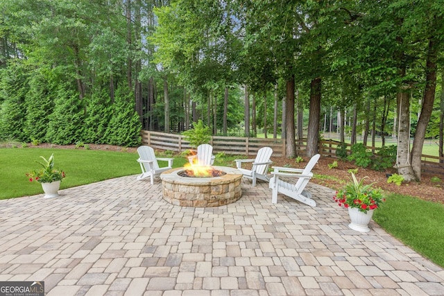 5095 Karr Rd, Cumming, GA 30040 - view of patio with a fire pit
