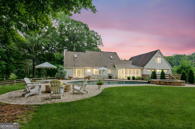 5095 Karr Rd, Cumming, GA 30040 - back of property featuring a fire pit, a patio, a chimney, and a pool with connected hot tub