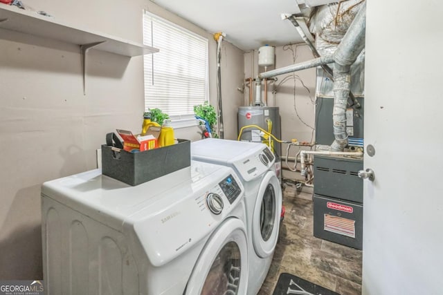 447 Sherwood Cir, Stone Mountain, GA 30087 - laundry area featuring washing machine and clothes dryer and gas water heater