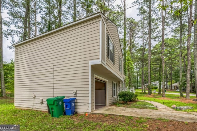 447 Sherwood Cir, Stone Mountain, GA 30087 - view of property exterior featuring a garage