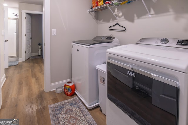 11 Rachel Ln, Hartwell, GA 30643 - laundry room with light wood-type flooring and washing machine and dryer
