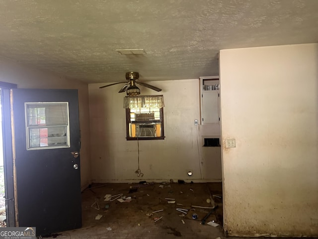 6337 Wellington Way, Austell, GA 30106 - unfurnished dining area with ceiling fan, a textured ceiling, and cooling unit