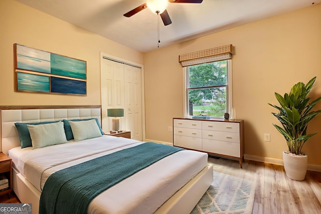 120 Fox Hunt Pl, Athens, GA 30606 - bedroom featuring wood finished floors, a closet, and ceiling fan