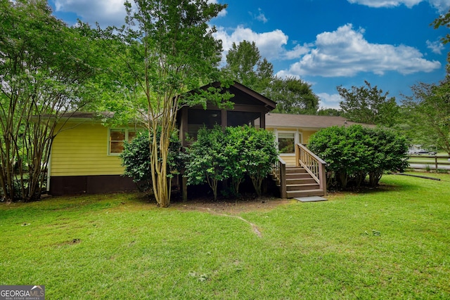 120 Fox Hunt Pl, Athens, GA 30606 - rear view of property featuring a yard, a sunroom, and stairs