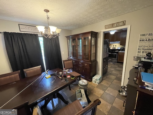 1791 Little Fawn Trl NW, Conyers, GA 30012 - dining area featuring a chandelier and a textured ceiling