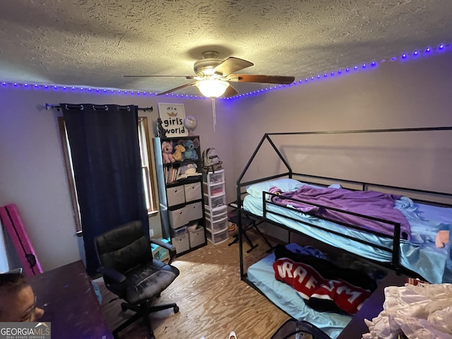 1791 Little Fawn Trl NW, Conyers, GA 30012 - bedroom with a textured ceiling and ceiling fan