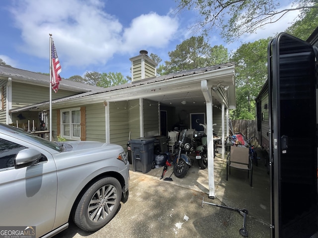 1791 Little Fawn Trl NW, Conyers, GA 30012 - view of side of property featuring a metal roof and a chimney