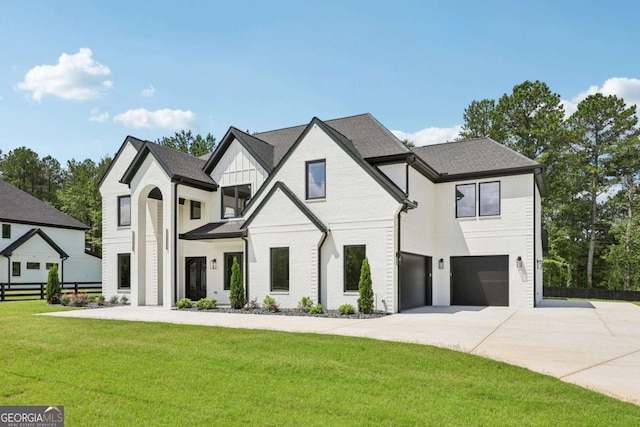 3205 Bold Springs Rd, Dacula, GA 30019 - view of front of property featuring driveway, a garage, and board and batten siding