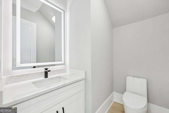 3205 Bold Springs Rd, Dacula, GA 30019 - bathroom with vaulted ceiling and vanity