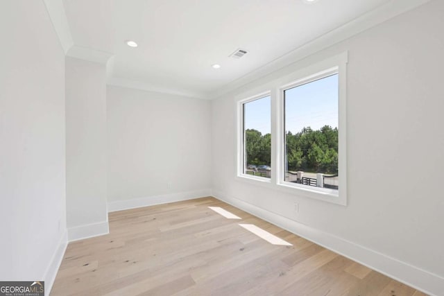 3205 Bold Springs Rd, Dacula, GA 30019 - spare room with recessed lighting, light wood-type flooring, and crown molding