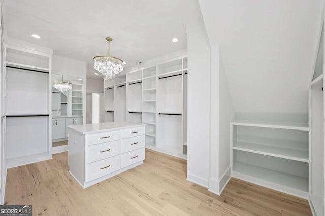 3205 Bold Springs Rd, Dacula, GA 30019 - spacious closet featuring a chandelier and light wood-type flooring