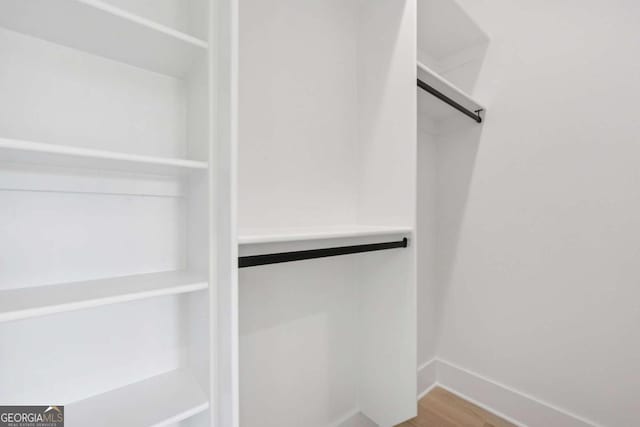 3205 Bold Springs Rd, Dacula, GA 30019 - walk in closet with wood finished floors