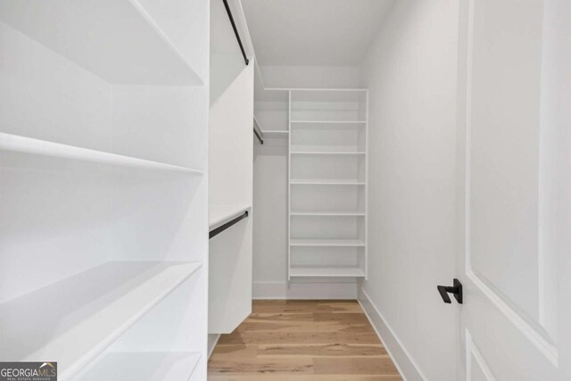 3205 Bold Springs Rd, Dacula, GA 30019 - walk in closet featuring light wood-style flooring