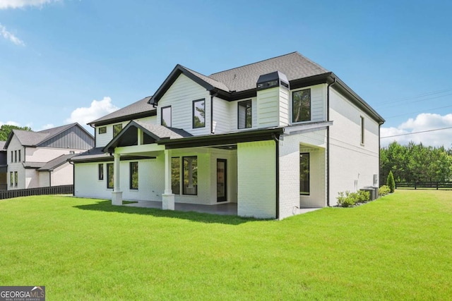 3205 Bold Springs Rd, Dacula, GA 30019 - rear view of property featuring brick siding and a shingled roof
