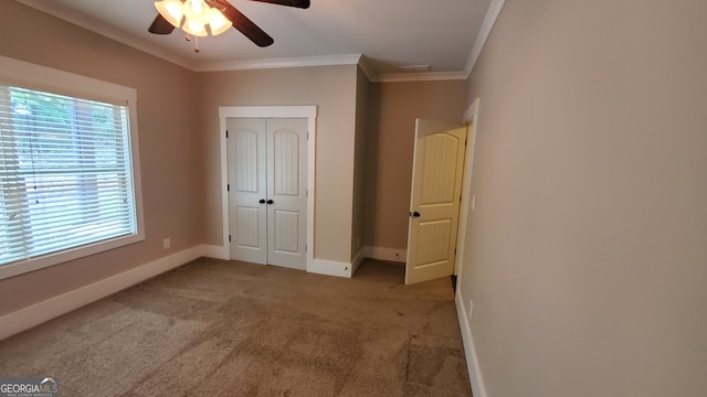 90 Alcovy Reserve Way, Covington, GA 30014 - unfurnished bedroom featuring crown molding, carpet floors, a closet, and ceiling fan