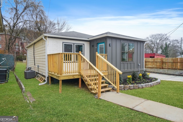 1 Lamar Ave SW, Atlanta, GA 30310 - view of front of home with board and batten siding and a wooden deck