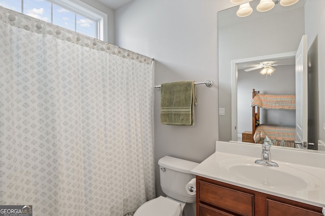 220 Begonia Ct, Griffin, GA 30223 - full bathroom with vanity, ceiling fan, and a shower with shower curtain