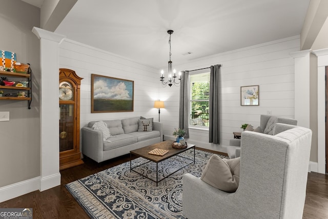 4813 Jess Helton Rd, Gainesville, GA 30506 - living area featuring wooden walls, a chandelier, and dark wood finished floors