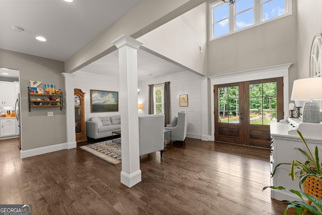 4813 Jess Helton Rd, Gainesville, GA 30506 - foyer with dark wood finished floors, french doors, ornate columns, recessed lighting, and a towering ceiling