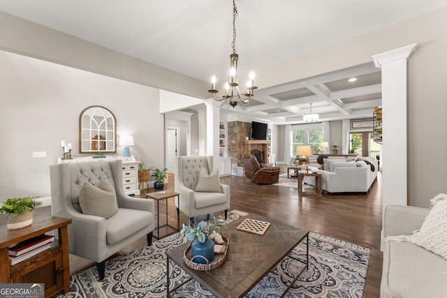 4813 Jess Helton Rd, Gainesville, GA 30506 - living room featuring a chandelier, coffered ceiling, dark wood-style floors, beamed ceiling, and ornate columns