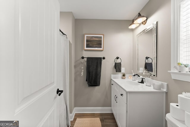 4813 Jess Helton Rd, Gainesville, GA 30506 - full bathroom featuring vanity and wood finished floors