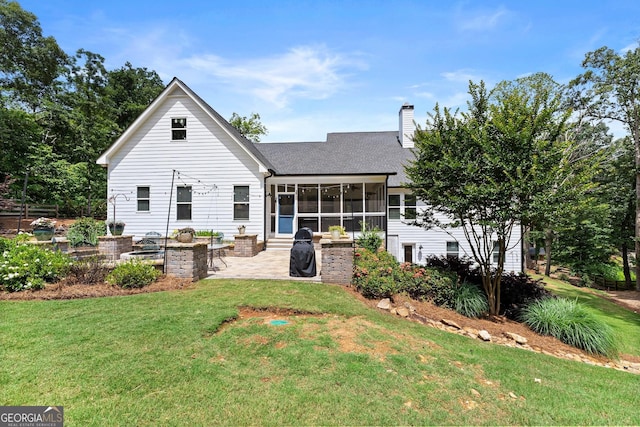4813 Jess Helton Rd, Gainesville, GA 30506 - rear view of house with a patio area, a chimney, a lawn, and a sunroom