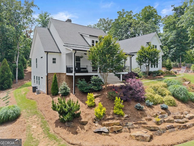 4813 Jess Helton Rd, Gainesville, GA 30506 - view of front of home featuring stairway, board and batten siding, ceiling fan, and a shingled roof