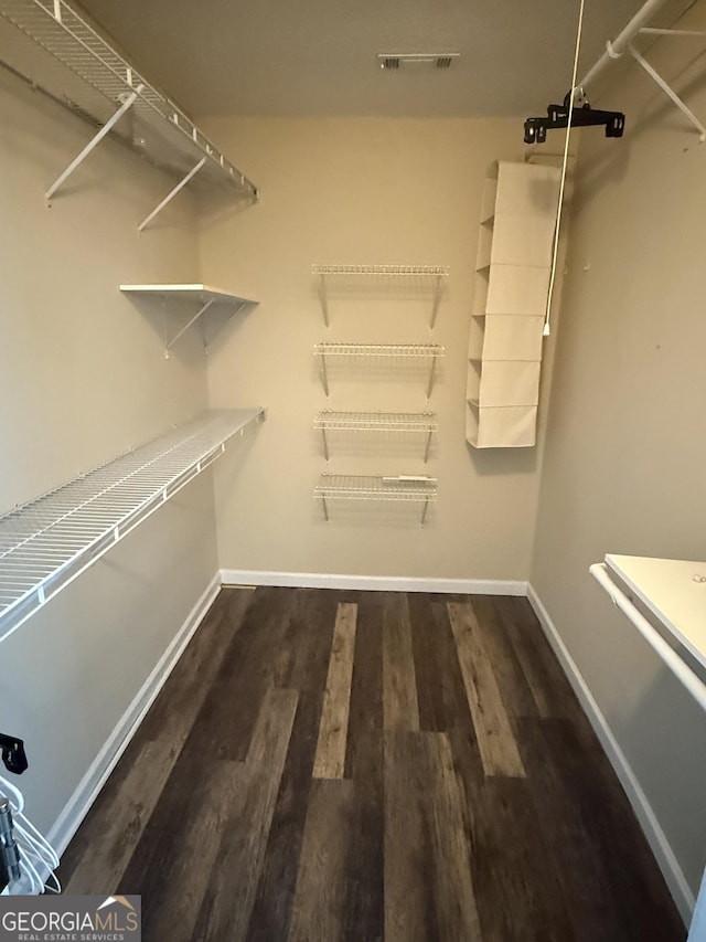 330 Anchors Way, Winder, GA 30680 - spacious closet featuring wood finished floors