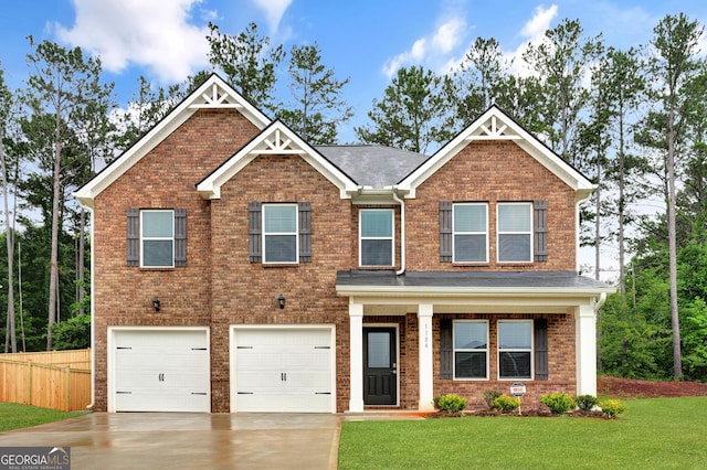 1184 Bluecoat Cir Unit 84, Hampton, GA 30228 - craftsman house with concrete driveway, an attached garage, and brick siding