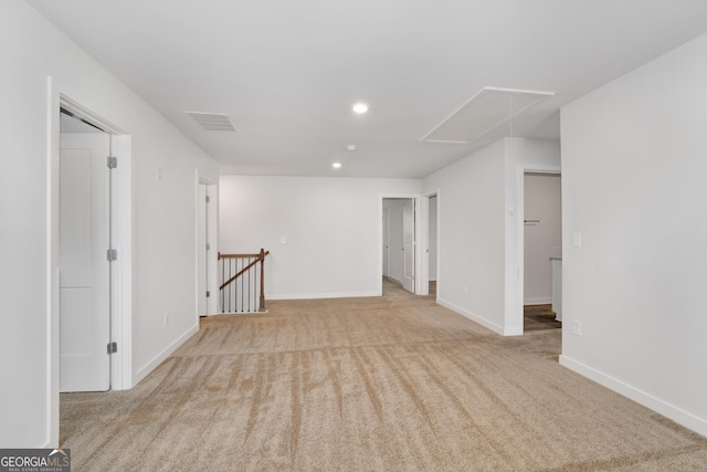 1184 Bluecoat Cir Unit 84, Hampton, GA 30228 - spare room featuring attic access, carpet floors, and recessed lighting