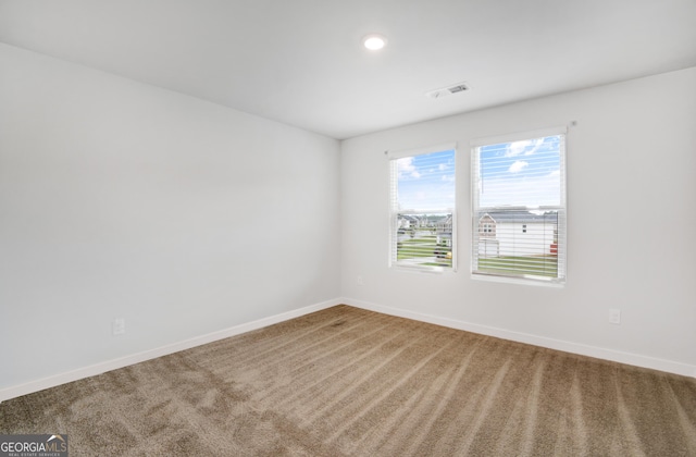 1184 Bluecoat Cir Unit 84, Hampton, GA 30228 - empty room featuring carpet and recessed lighting
