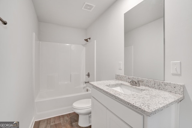 1184 Bluecoat Cir Unit 84, Hampton, GA 30228 - full bath with vanity, wood finished floors, and  shower combination