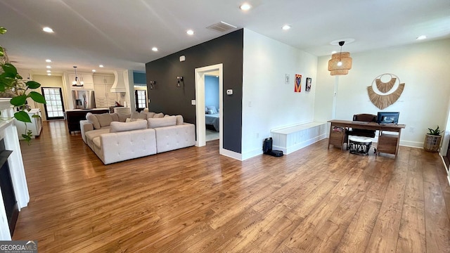 420 Ashbury Cir, Dallas, GA 30157 - living area with wood finished floors, a fireplace, recessed lighting, and a desk