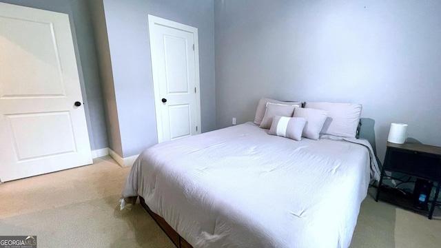 420 Ashbury Cir, Dallas, GA 30157 - bedroom featuring light carpet and baseboards