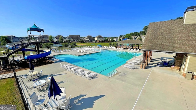 420 Ashbury Cir, Dallas, GA 30157 - community pool featuring a gazebo, a patio, and a water slide
