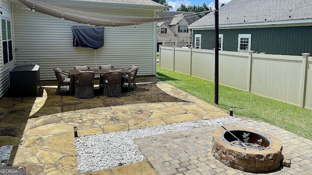 420 Ashbury Cir, Dallas, GA 30157 - view of patio / terrace featuring a fire pit and outdoor dining area