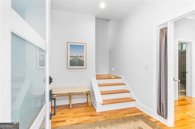 167 Sampson St, Atlanta, GA 30312 - stairway featuring wood finished floors and baseboards