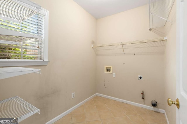 5035 Foxberry Ln, Roswell, GA 30075 - laundry area featuring washer hookup, hookup for a gas dryer, electric dryer hookup, and light tile patterned floors