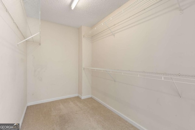 5035 Foxberry Ln, Roswell, GA 30075 - walk in closet with carpet