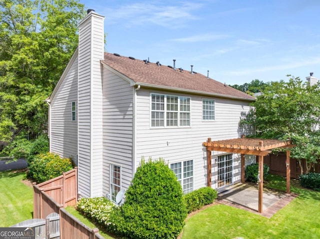5035 Foxberry Ln, Roswell, GA 30075 - back of house with a pergola, a patio area, and a chimney