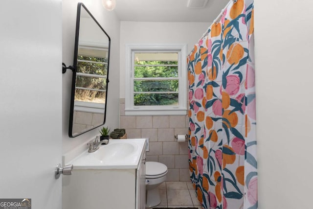 3205 Mcafee Rd, Decatur, GA 30032 - bathroom with tile walls, vanity, tile patterned flooring, a shower with curtain, and a wainscoted wall