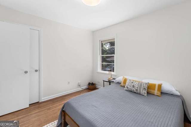 3205 Mcafee Rd, Decatur, GA 30032 - bedroom with wood finished floors and baseboards