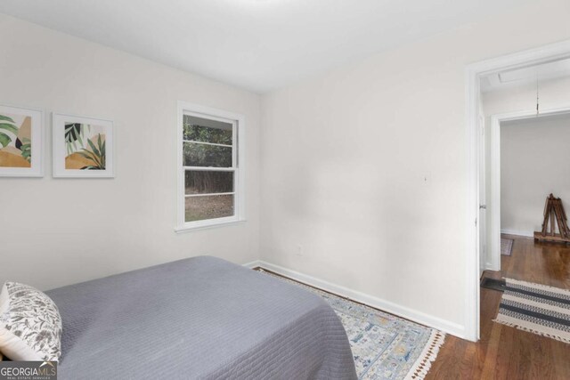 3205 Mcafee Rd, Decatur, GA 30032 - bedroom featuring attic access and wood finished floors