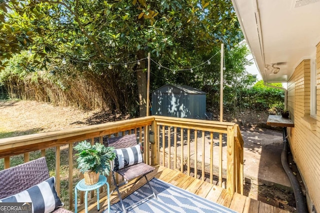 3205 Mcafee Rd, Decatur, GA 30032 - wooden terrace with a storage shed
