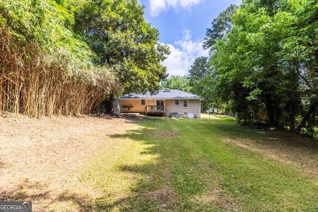 3205 Mcafee Rd, Decatur, GA 30032 - view of grassy yard with a wooden deck