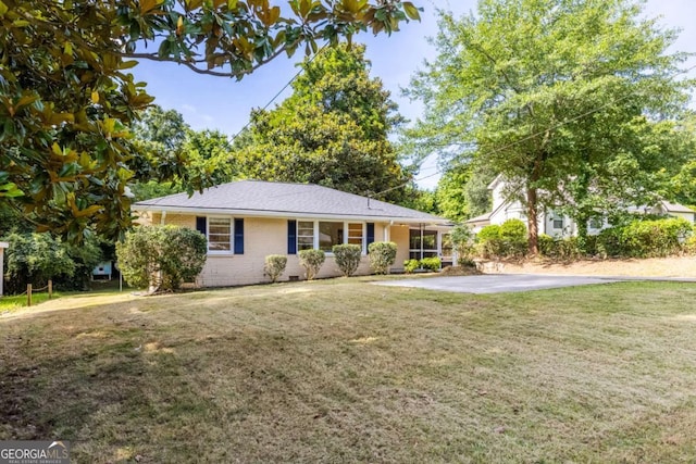 3205 Mcafee Rd, Decatur, GA 30032 - ranch-style home with brick siding and a front yard