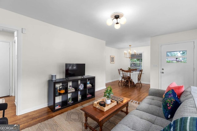 3205 Mcafee Rd, Decatur, GA 30032 - living room with a chandelier and wood finished floors